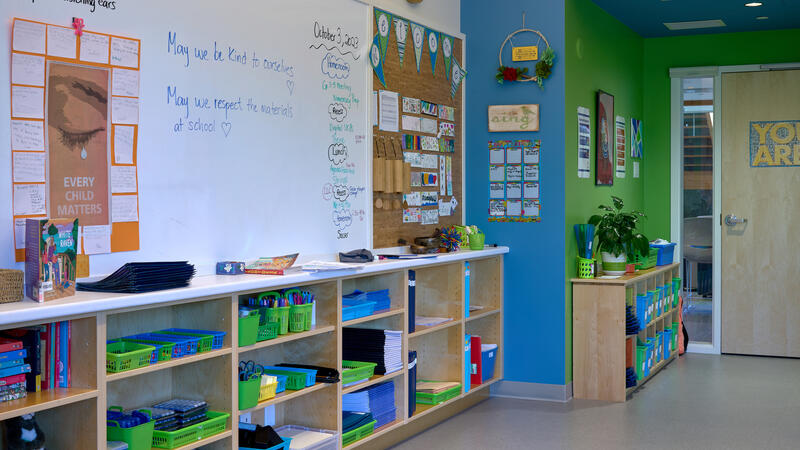 Bright colours and very organized shelves create a welcome environment