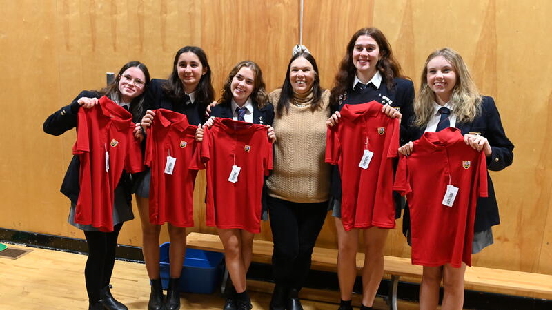 A group of Lifers pose with a former Junior School teacher 