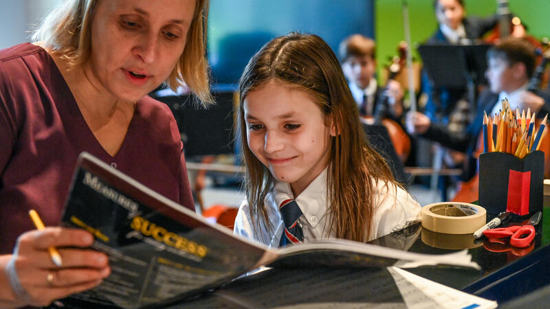 Junior School students learn in strings class