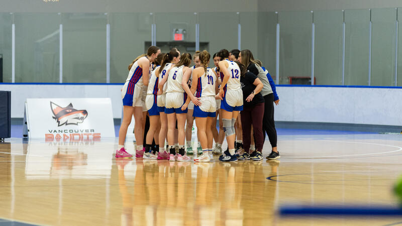 Senior Girls Basketball Team Huddle