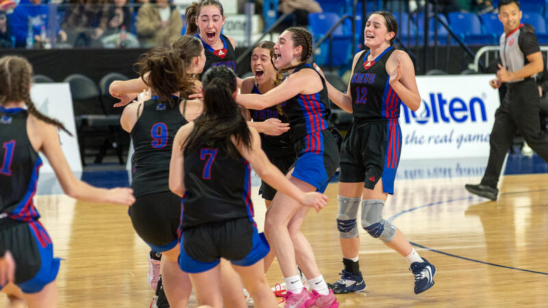 SMUS Senior Girls basketball team celebrate together as BC Champions