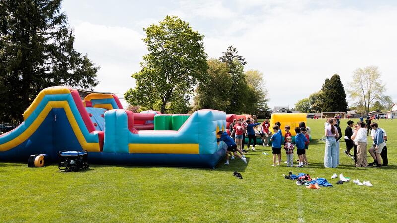2025 Alumni Weekend Bouncy Castles full of line ups and fun