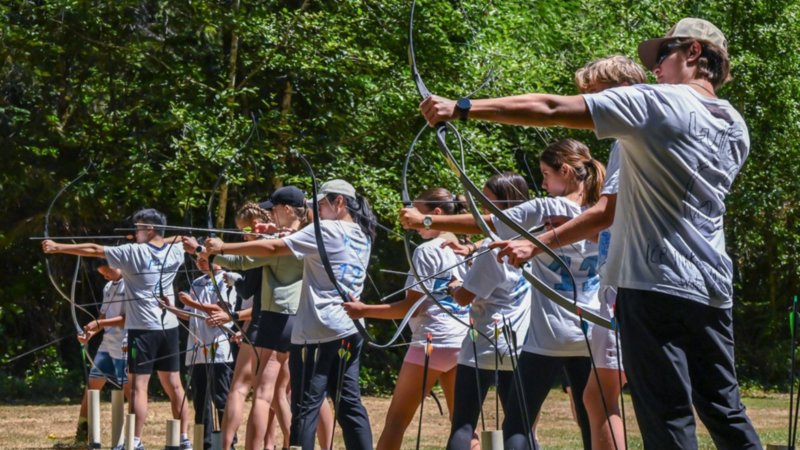 Rising Leaders camp doing archery at Camp Bernard