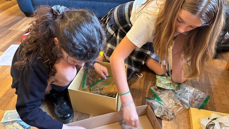 Junior School SMUS students collecting money for the Season of Caring