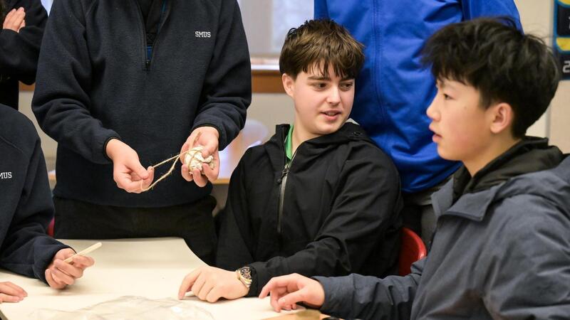 Students work on designs for the Link Leaders Egg Drop Challenge