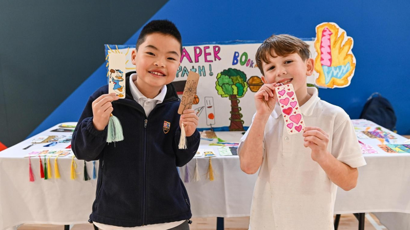 SMUS students in the Entrepreneur Club display their products at a marketplace