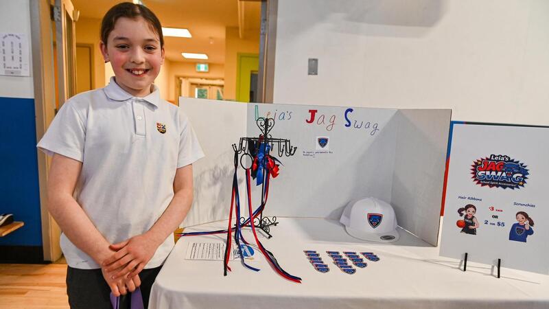 SMUS students in the Entrepreneur Club display their products at a marketplace