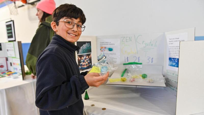 SMUS students in the Entrepreneur Club display their products at a marketplace