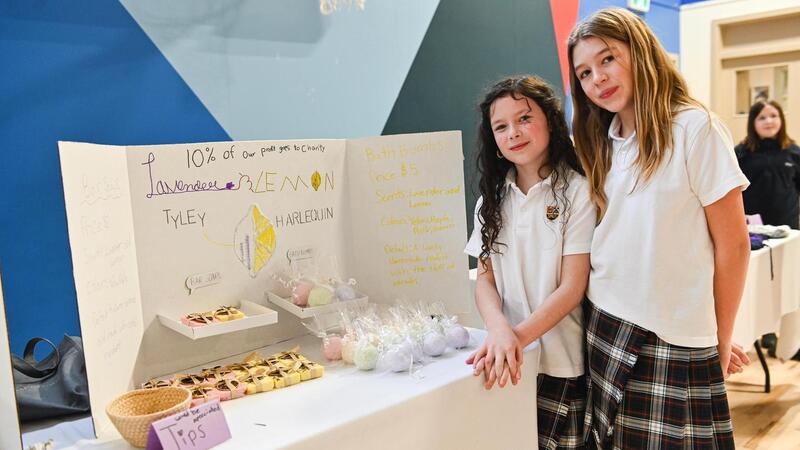 SMUS students in the Entrepreneur Club display their products at a marketplace