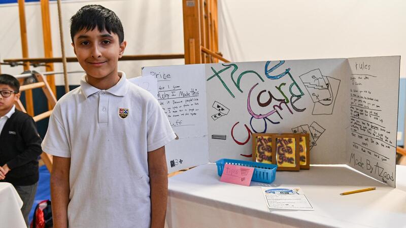 SMUS students in the Entrepreneur Club display their products at a marketplace
