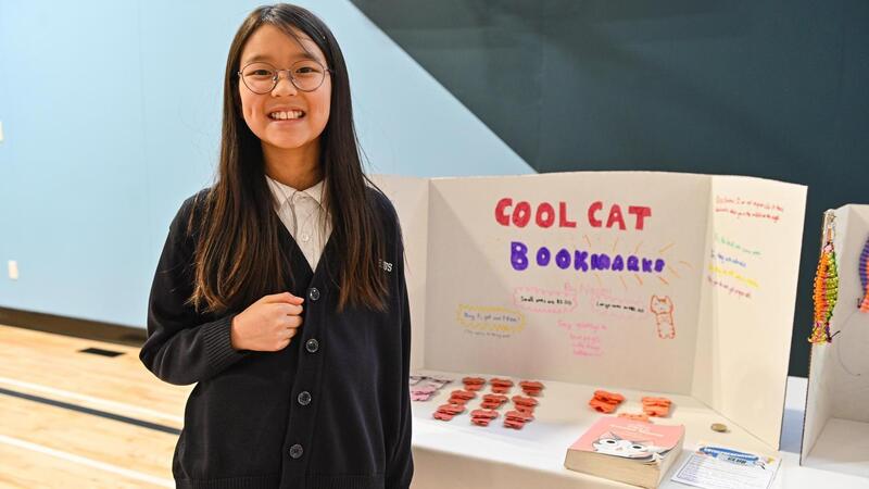 SMUS students in the Entrepreneur Club display their products at a marketplace