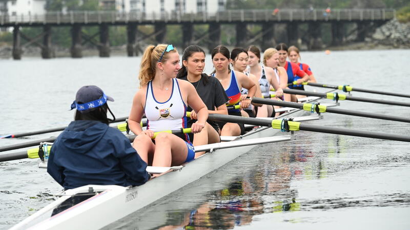 SMUS Rowers and later, guests, row in the new shell