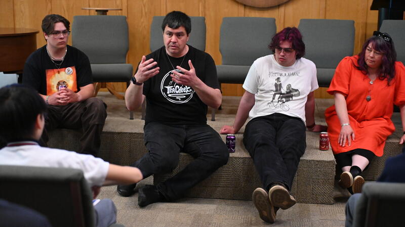 Jacob Beaton and his family speak in Chapel