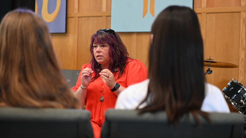 Jessica Ouellette-Beaton speaks with Middle School students in Chapel