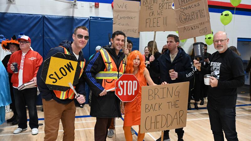 Eliot Anderson with staff at Halloween