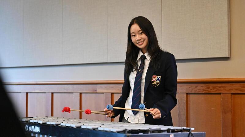 Kayler Kim plays the xylophone