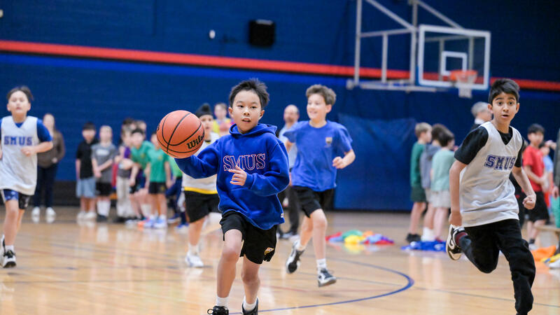 Junior School basketball student